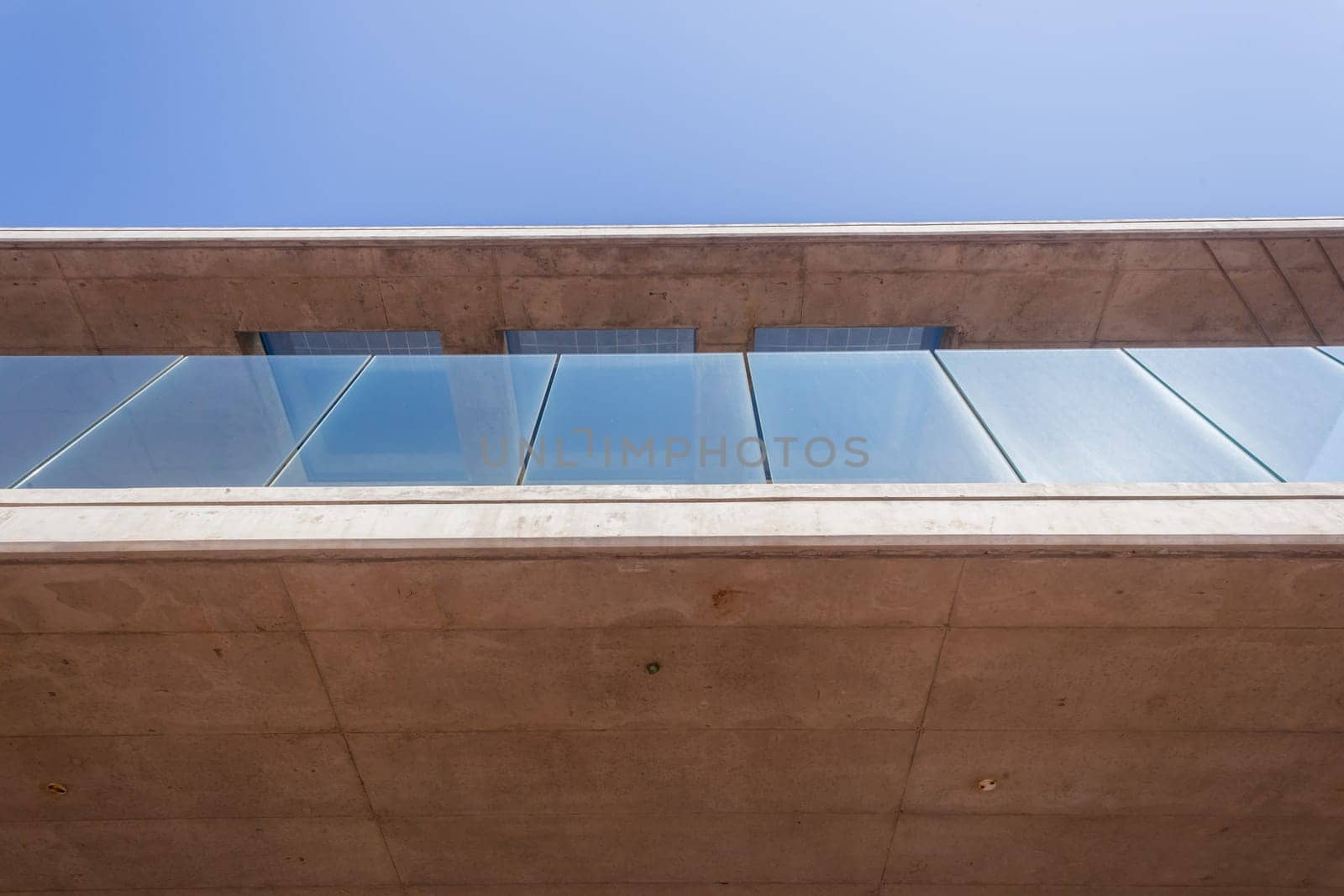 Building in concrete glass abstract section in blue sky