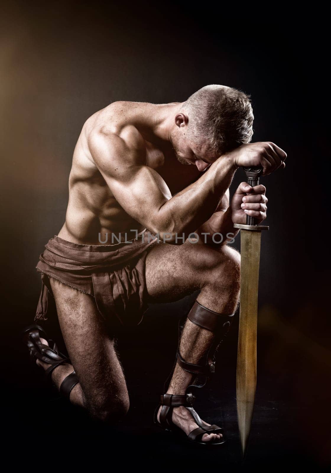 a muscular man with a sword in pose