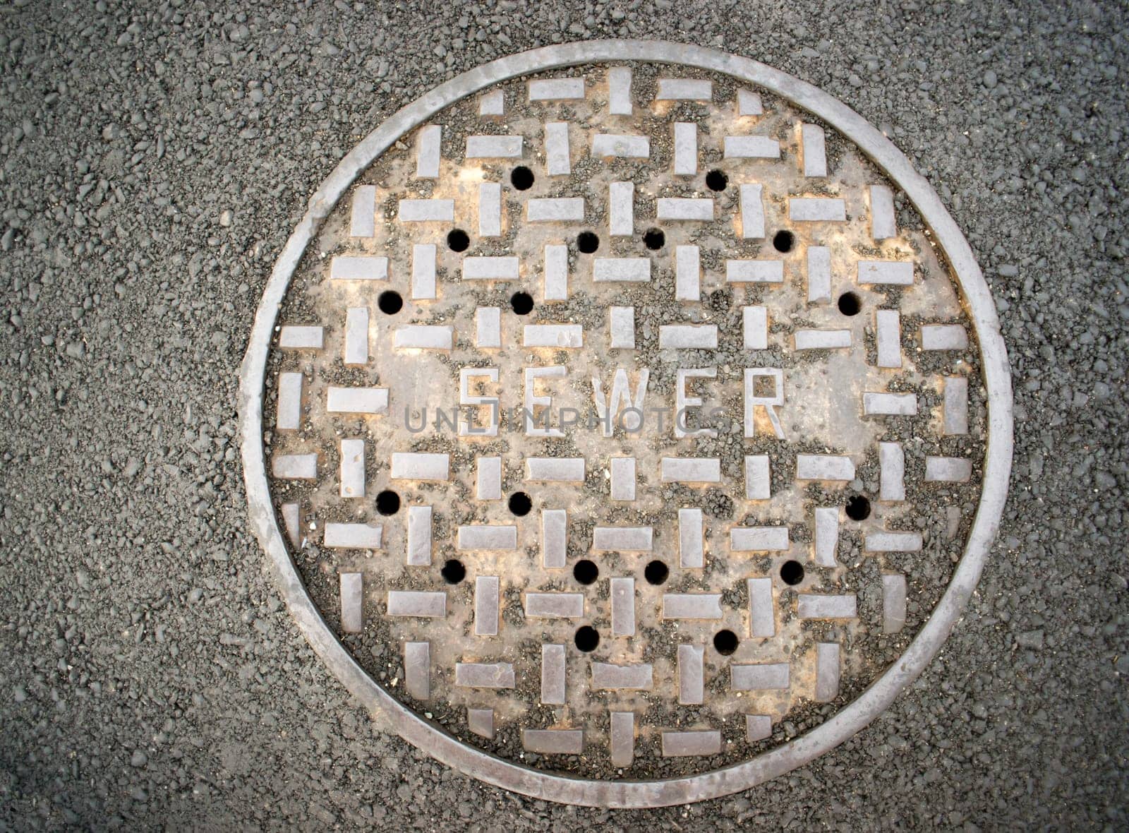 One can even find beauty in a manhole sewer cover