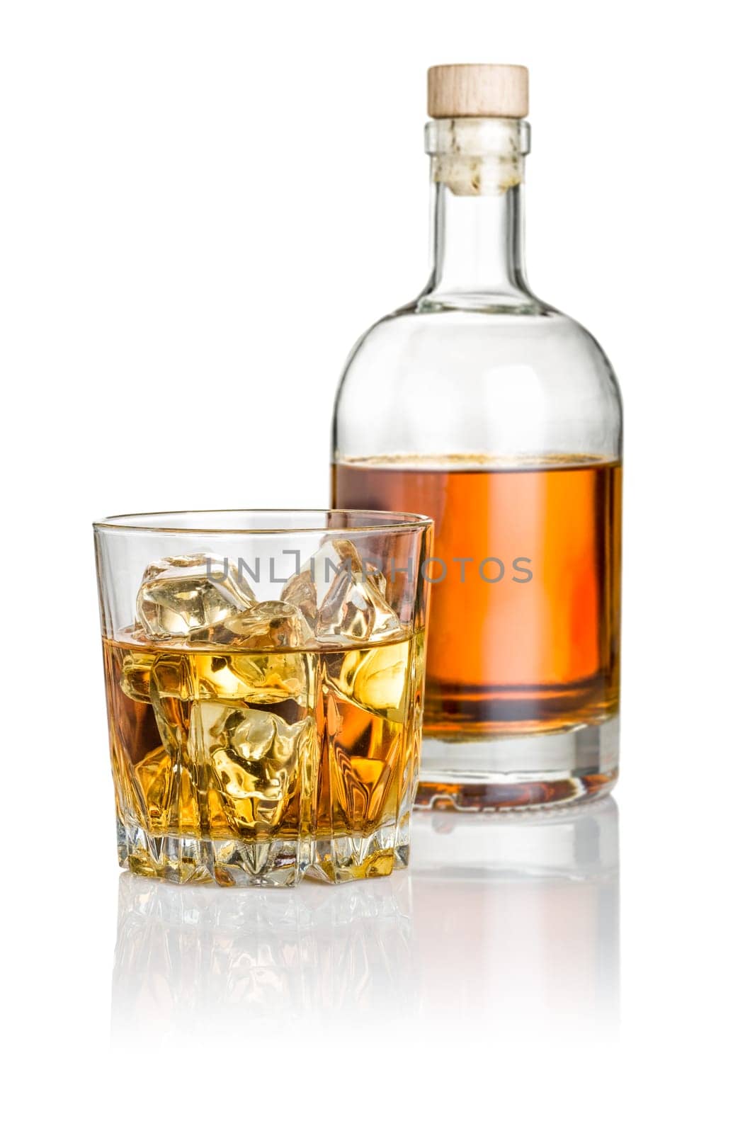 Whisky on the rocks with bottle