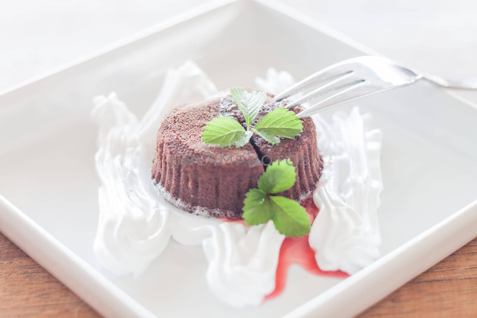 Chocolate lava on white plate, stock photo