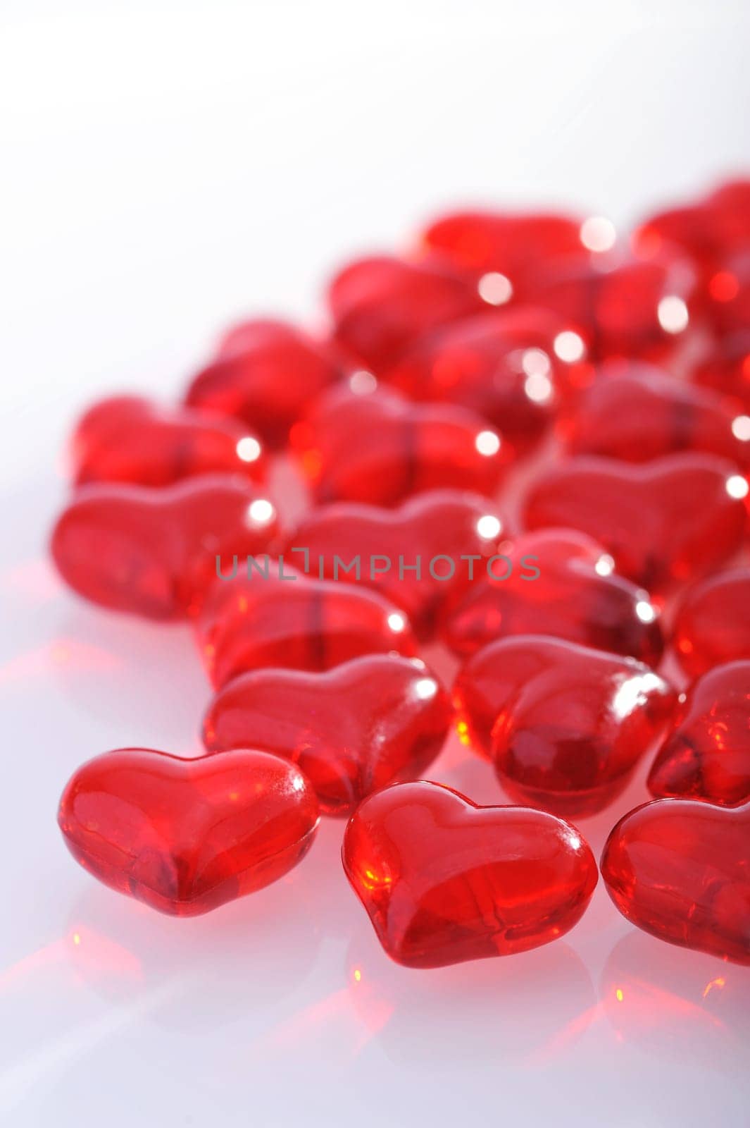 Red glass hearts on a white background