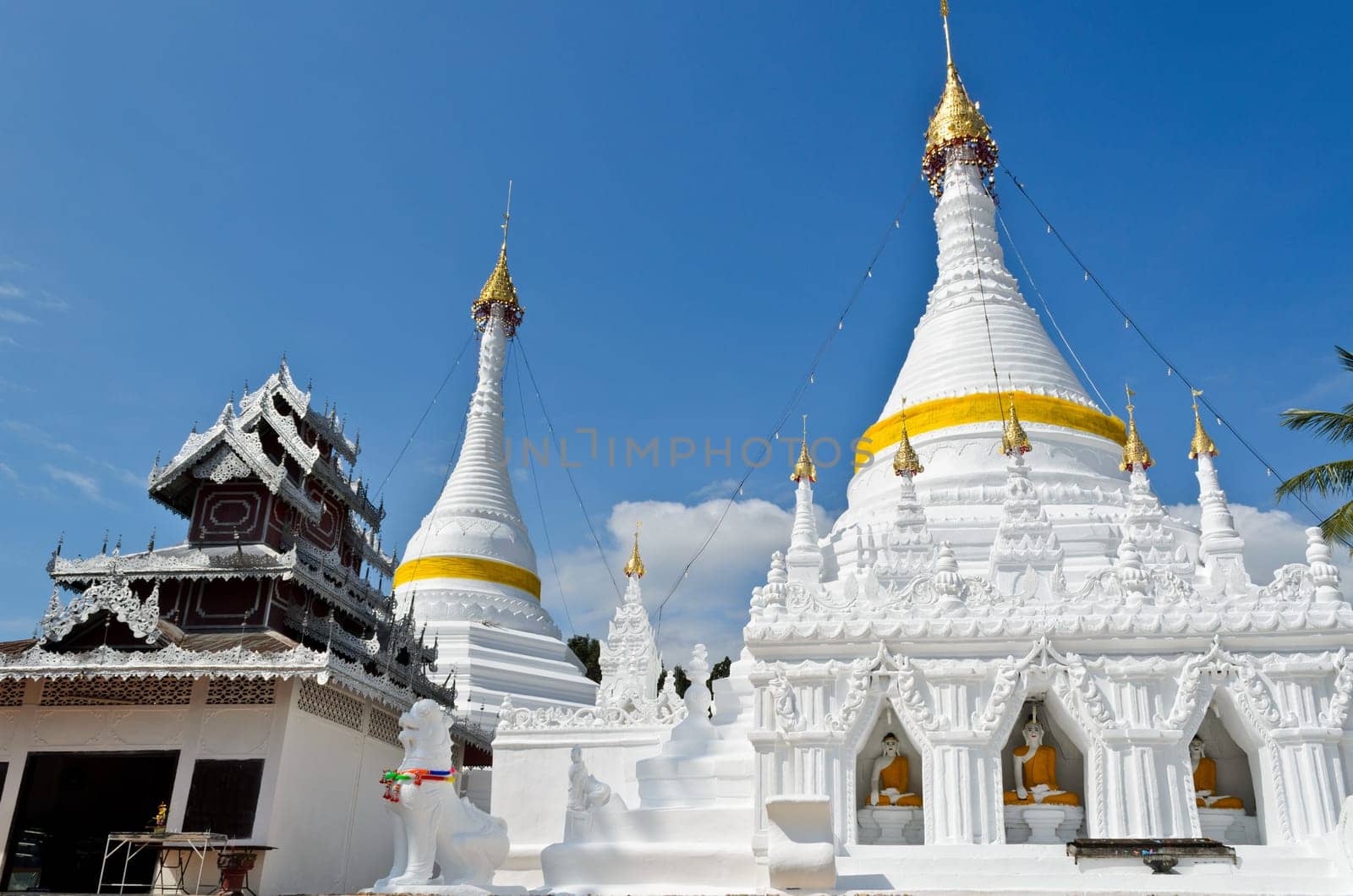 White pagoda architecture at Wat Phra That Doi Kong Mu Temple in Mae Hong Son Province of northern Thailand.