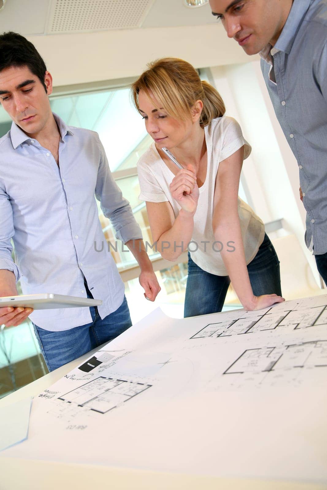 Group of architects working in office