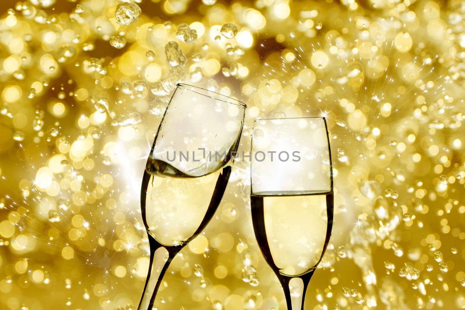 Champangne glasses on sparkling background