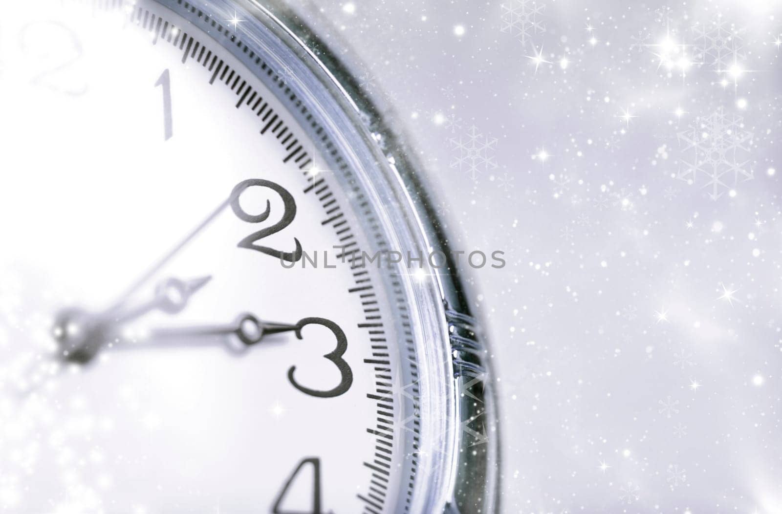 New Year's at midnight - Old clock with stars snowflakes and holiday lights