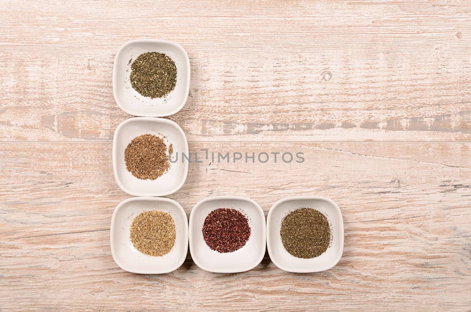 Tea assortment on an old rustic wooden background