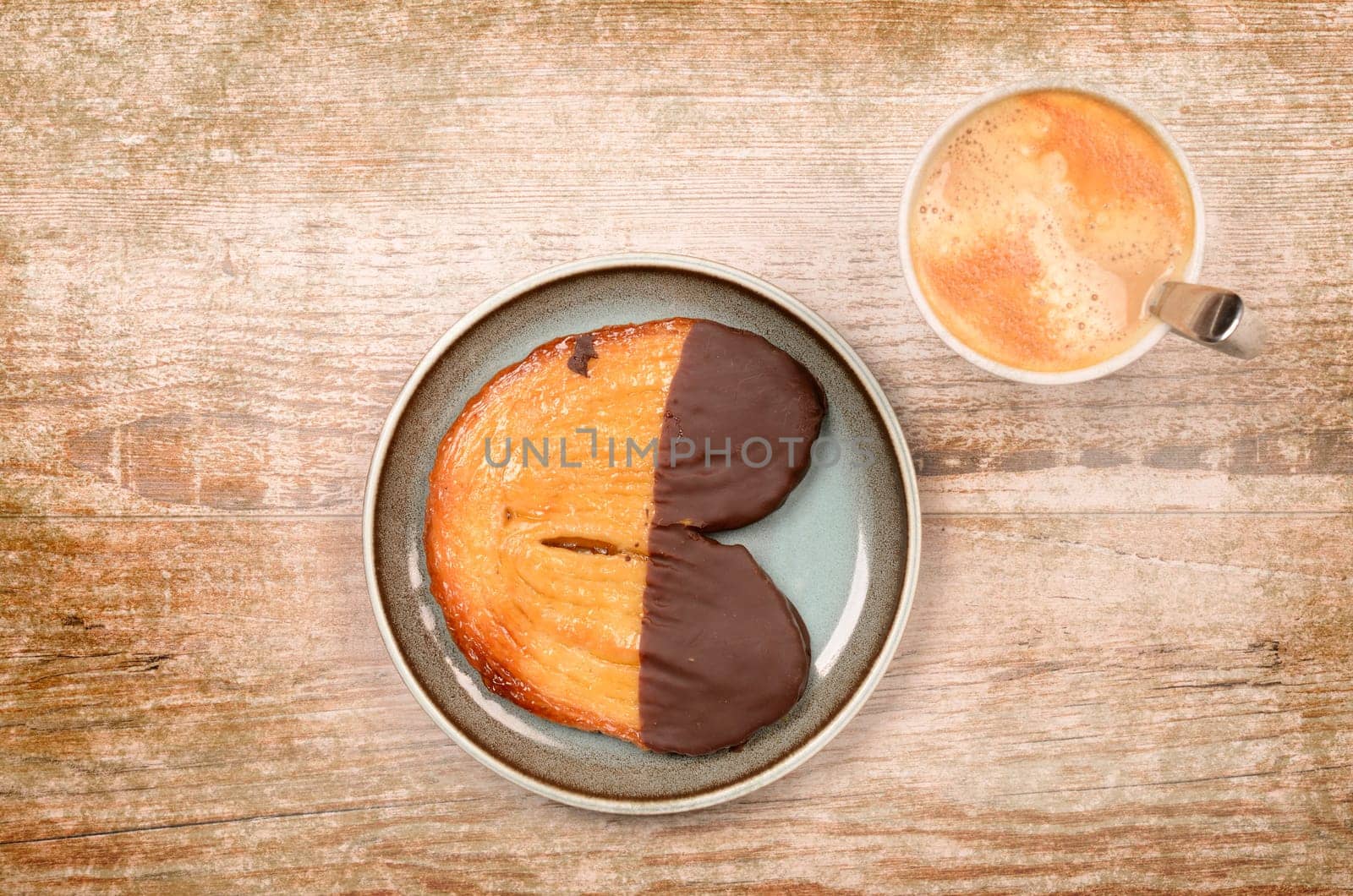 Sweet baked cookie with a cup of coffee
