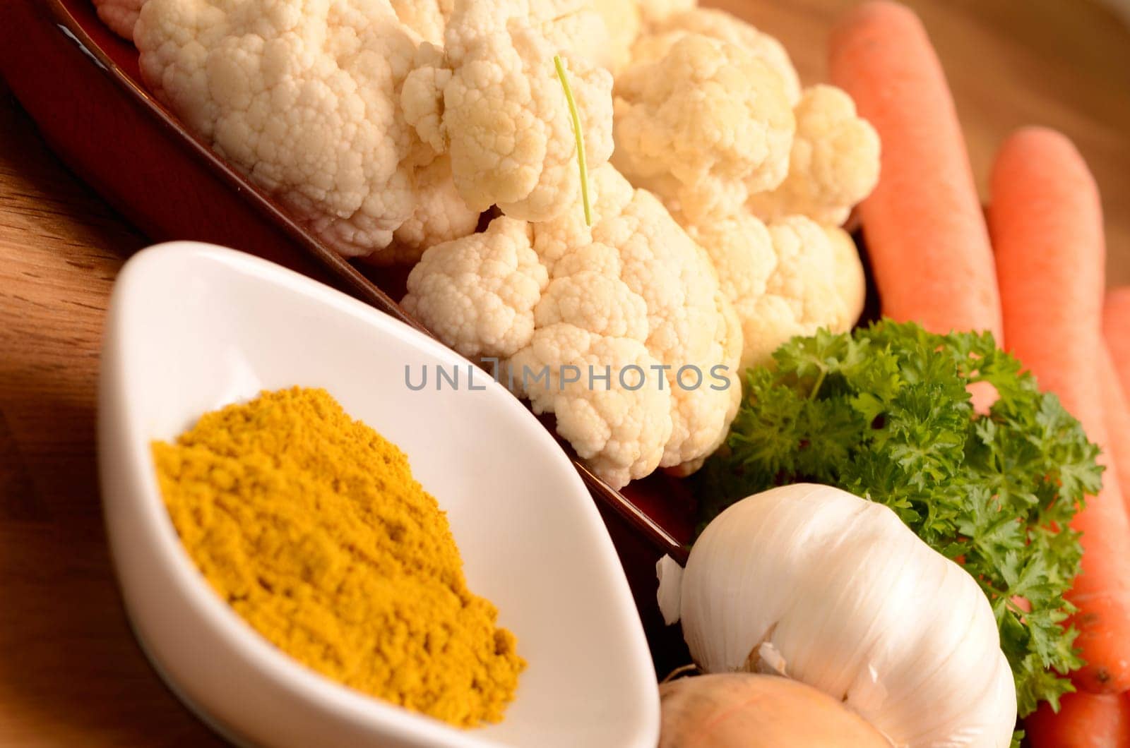 vegetables and cooking ingredients on a kitchen table