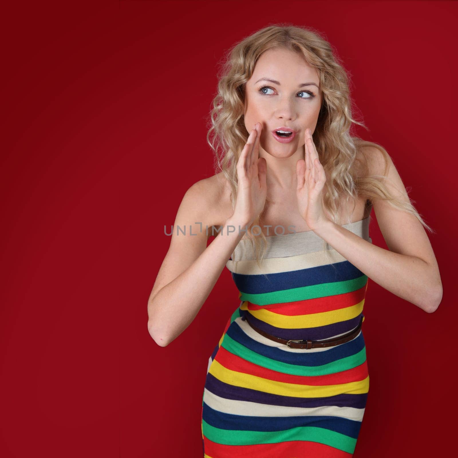 Blond woman with attitude of whispering