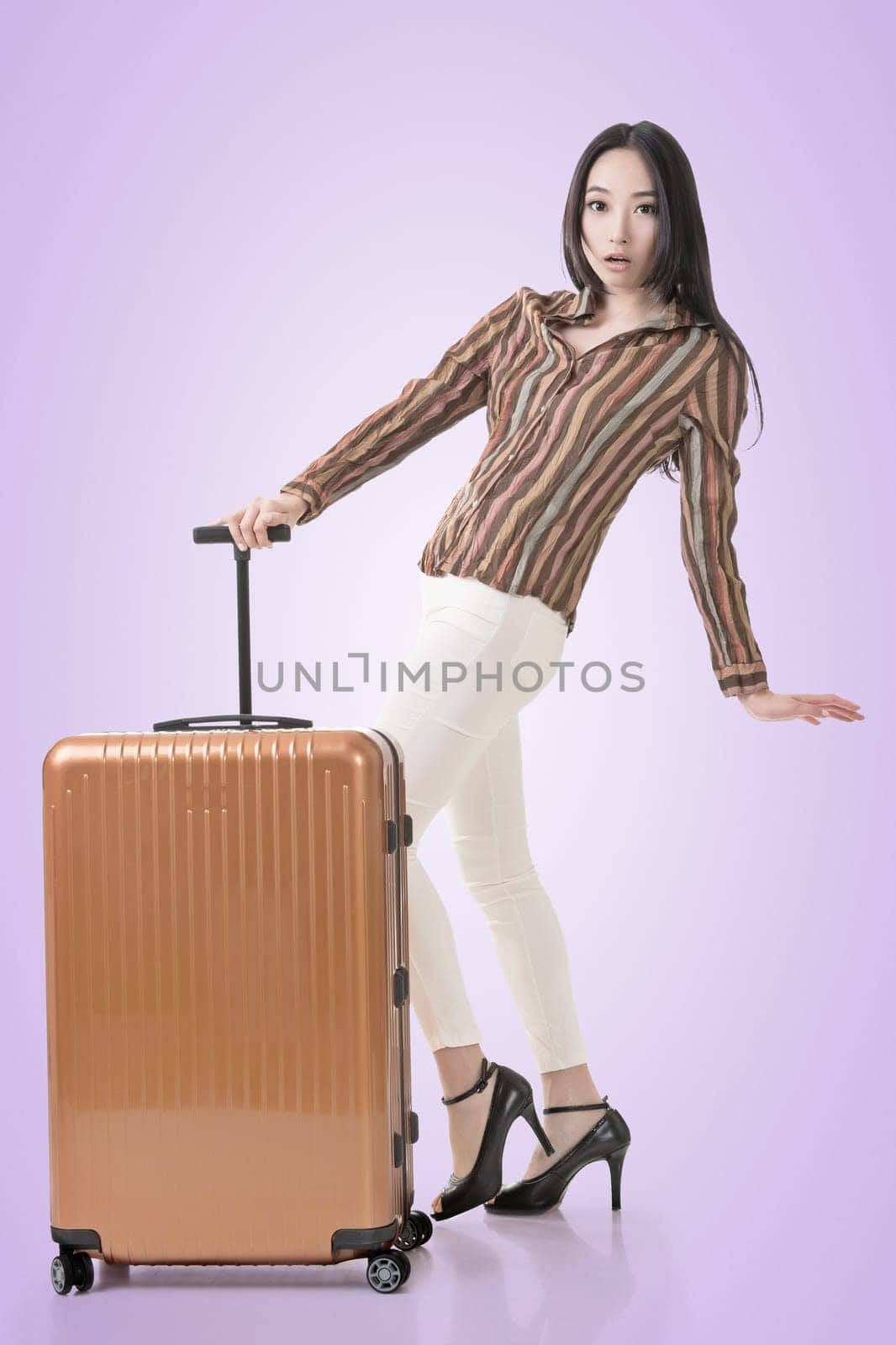 Modern Asian woman stand with a luggage.