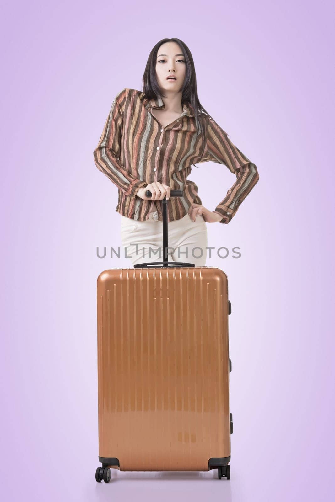 Modern Asian woman stand with a luggage.