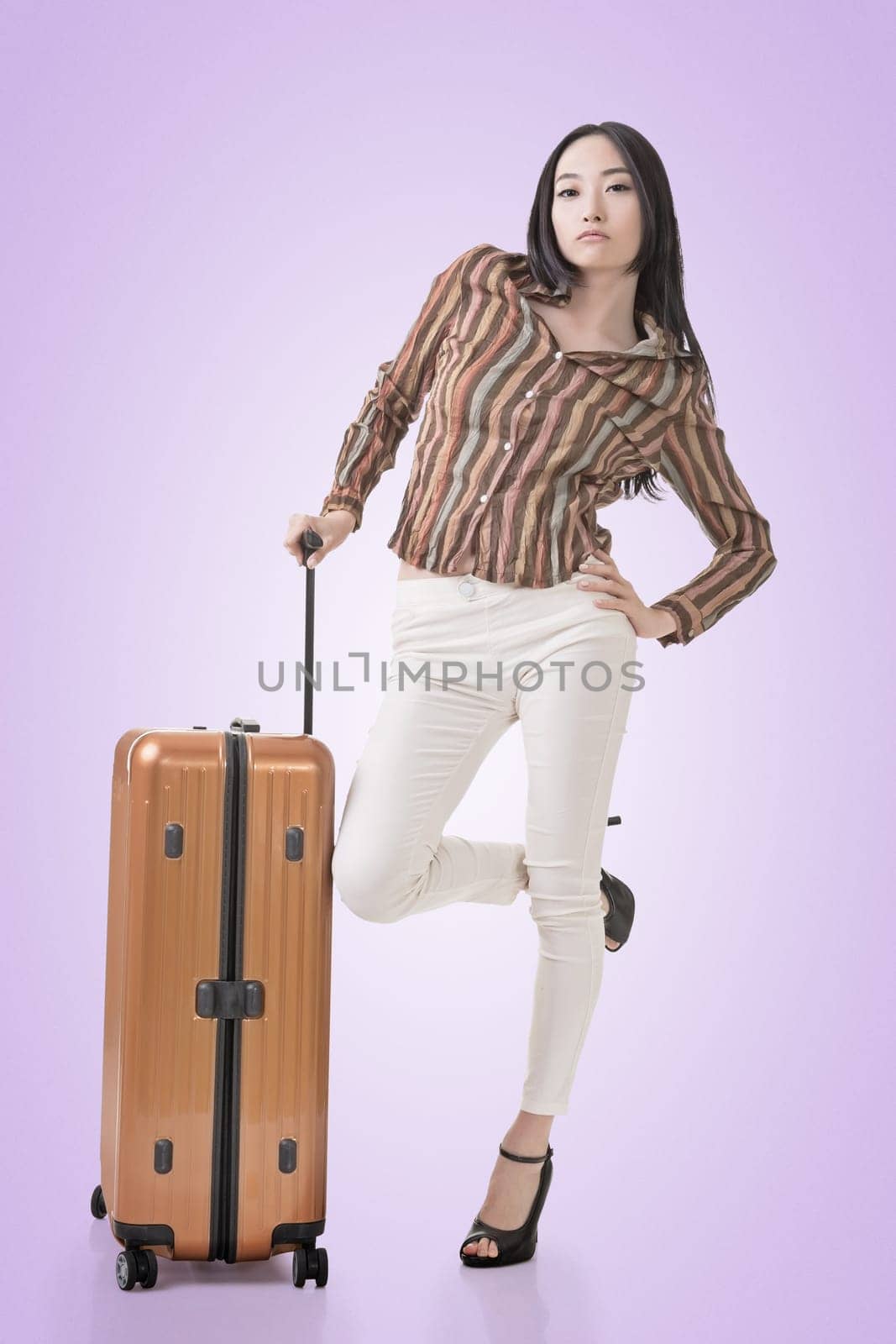 Modern Asian woman stand with a luggage in vintage style.