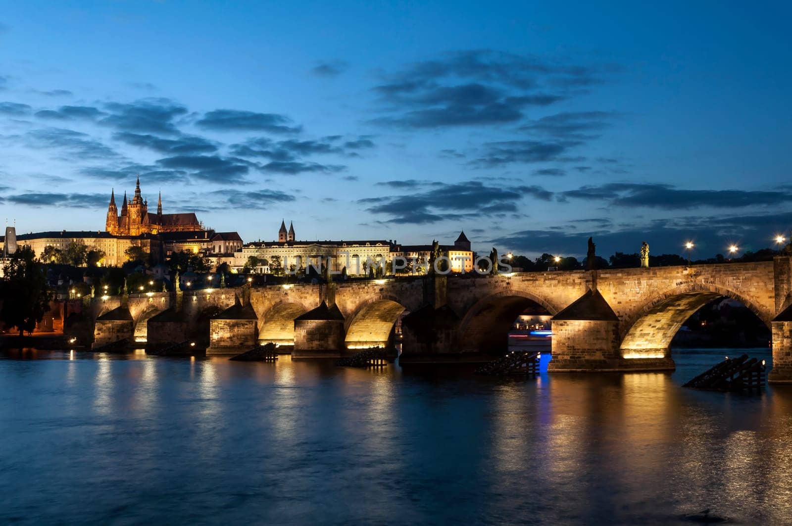 St. Vitus Cathedral and Charles bridge at night, Prague, Czech Republic.