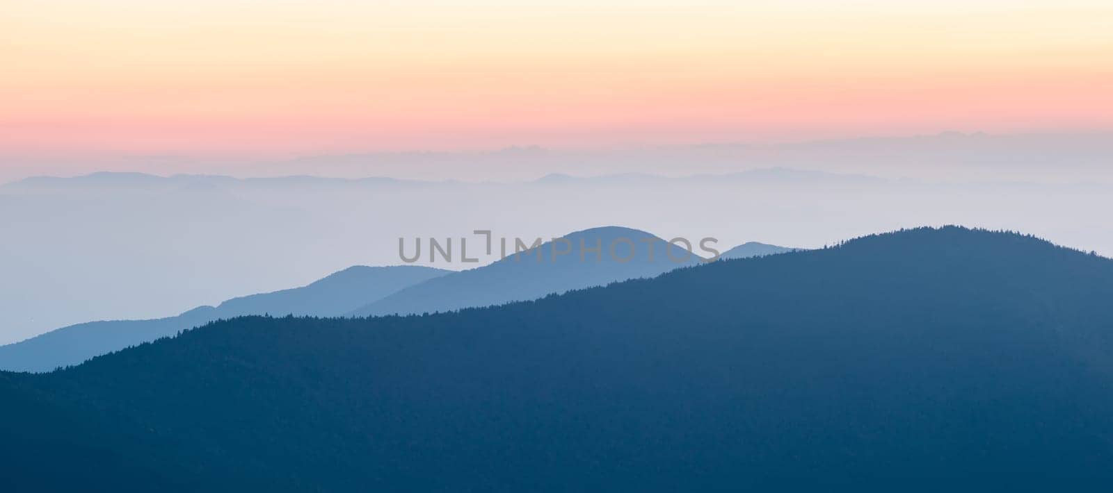 Panorama  of mountain ridges silhouettes