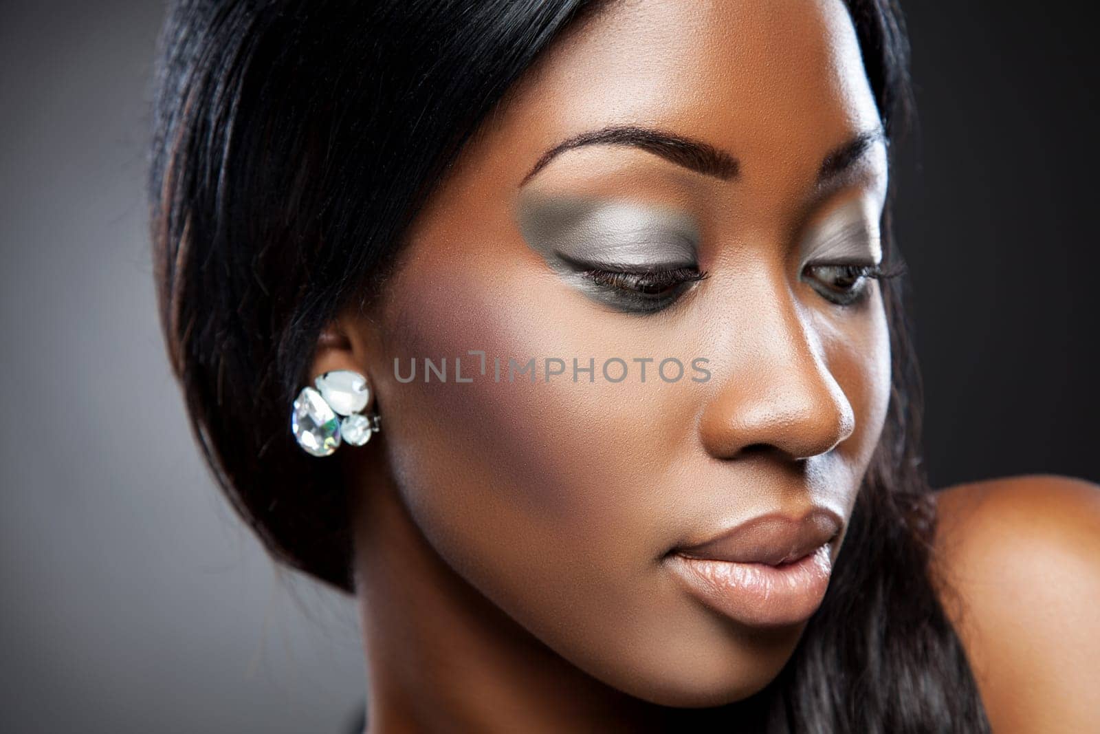Beautiful young black woman with makeup
