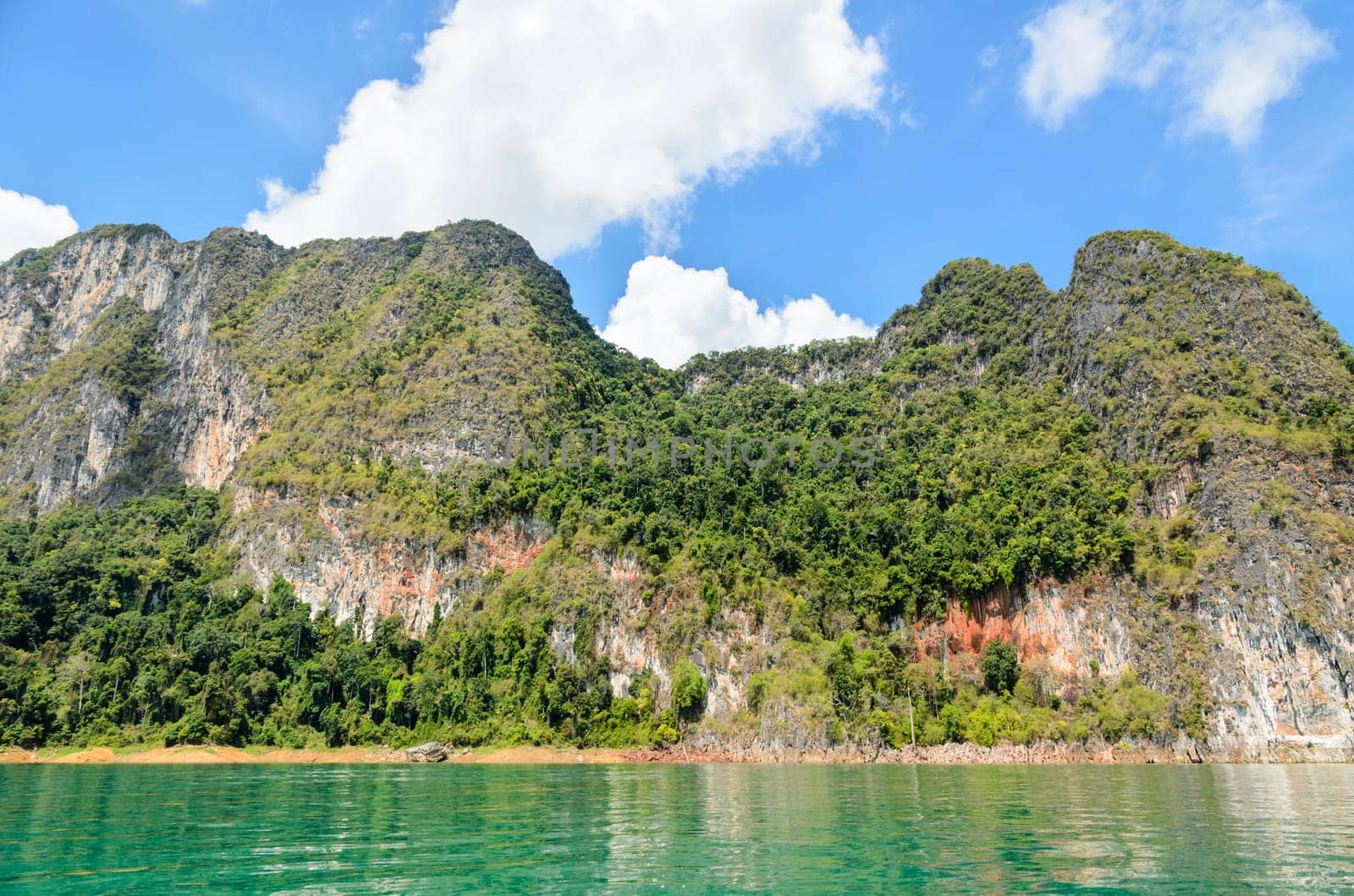Beautiful mountain surrounded by water, Natural attractions at Ratchapapha dam in Khao Sok National Park, Surat Thani province, Guilin of Thailand.