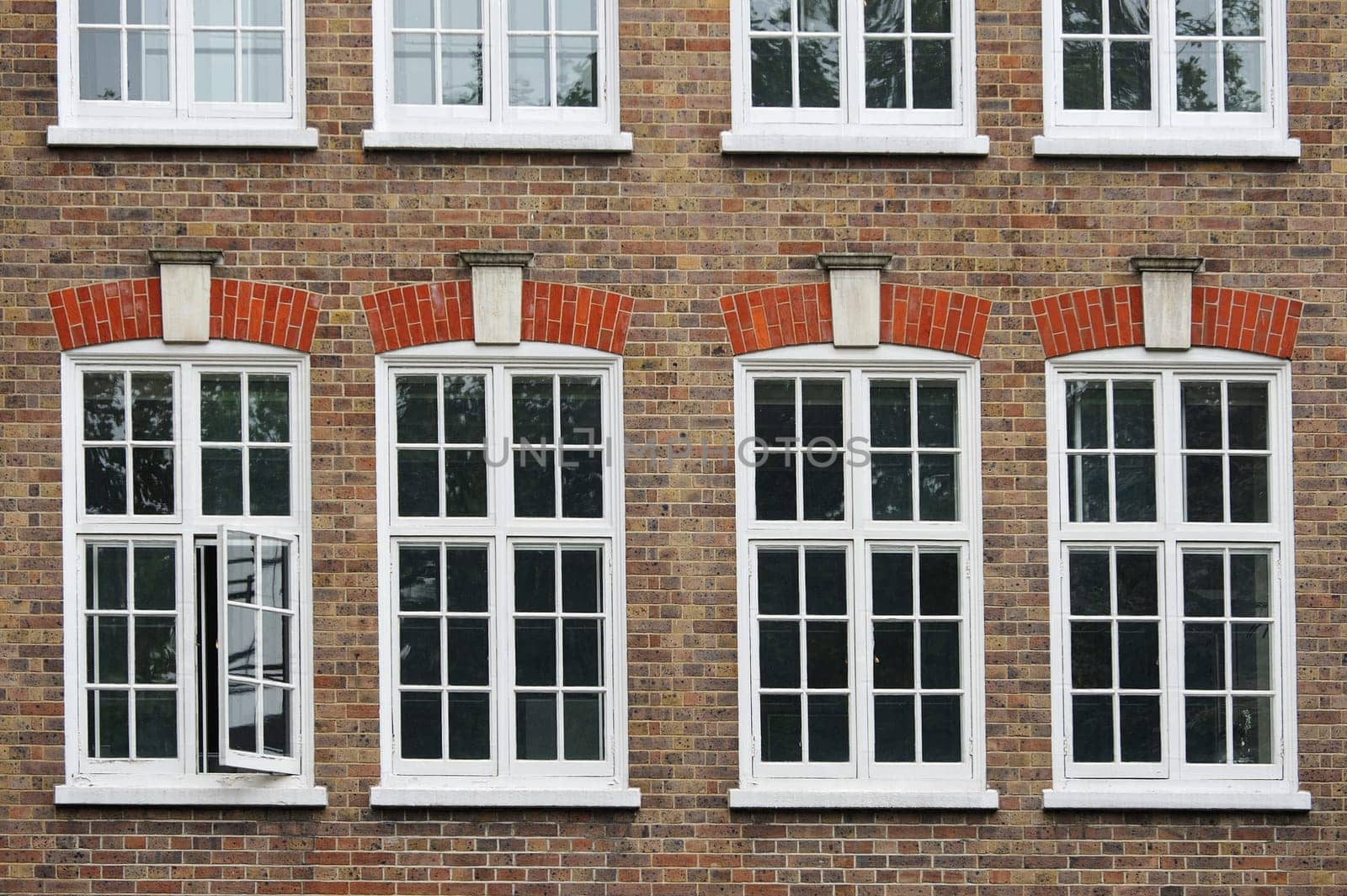 White windows in brick house