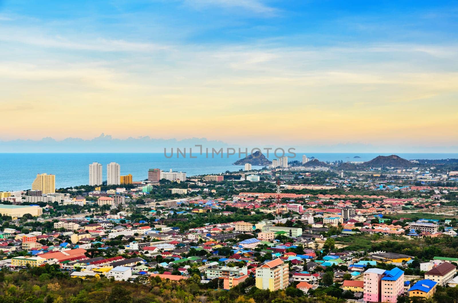 Hight angle view landscaped Hua Hin city in the evening, Beautiful scenery town seaside at Prachuap Khiri Khan Province of Thailand.