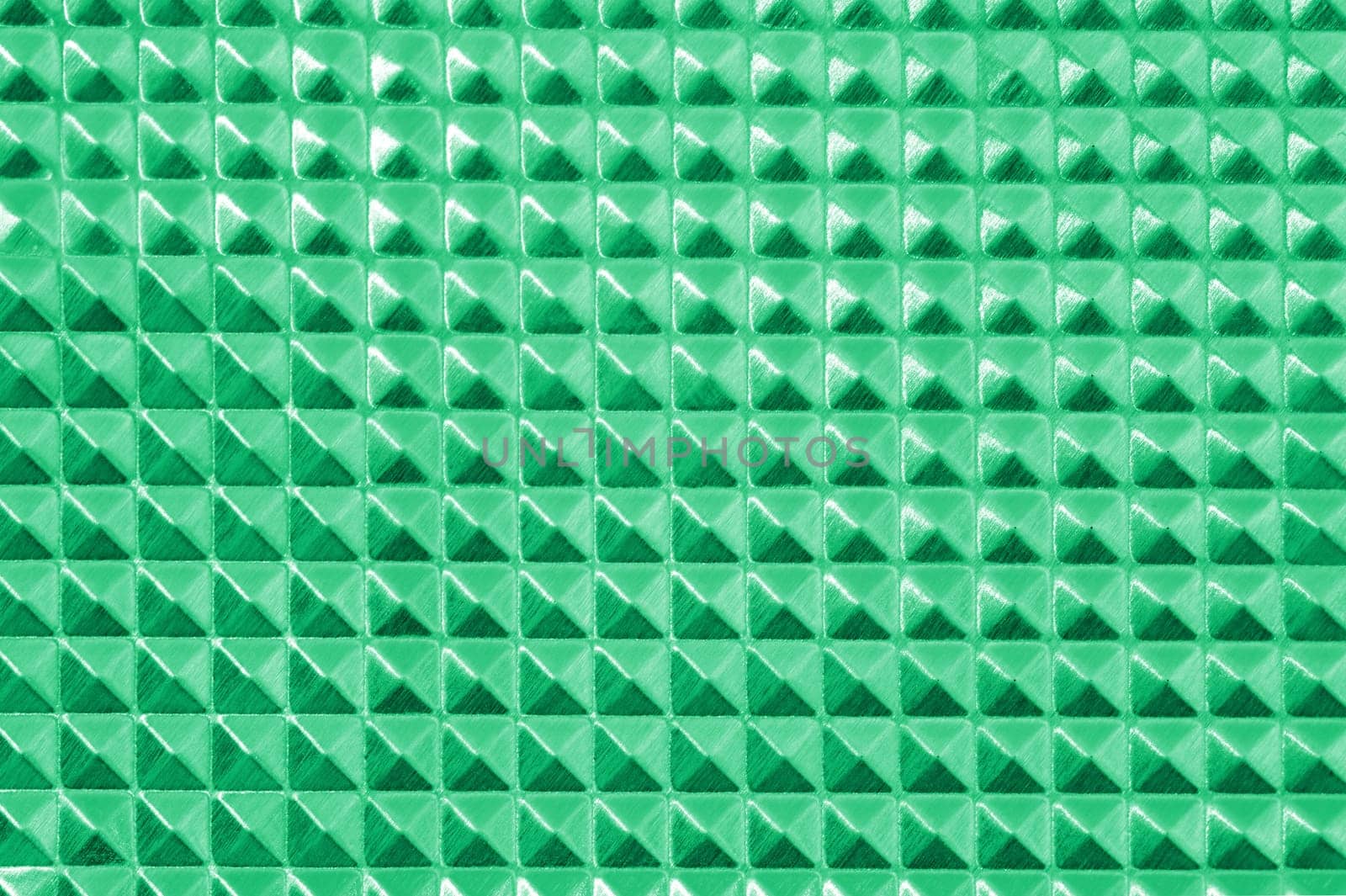 A close up shot of a metal background imprint