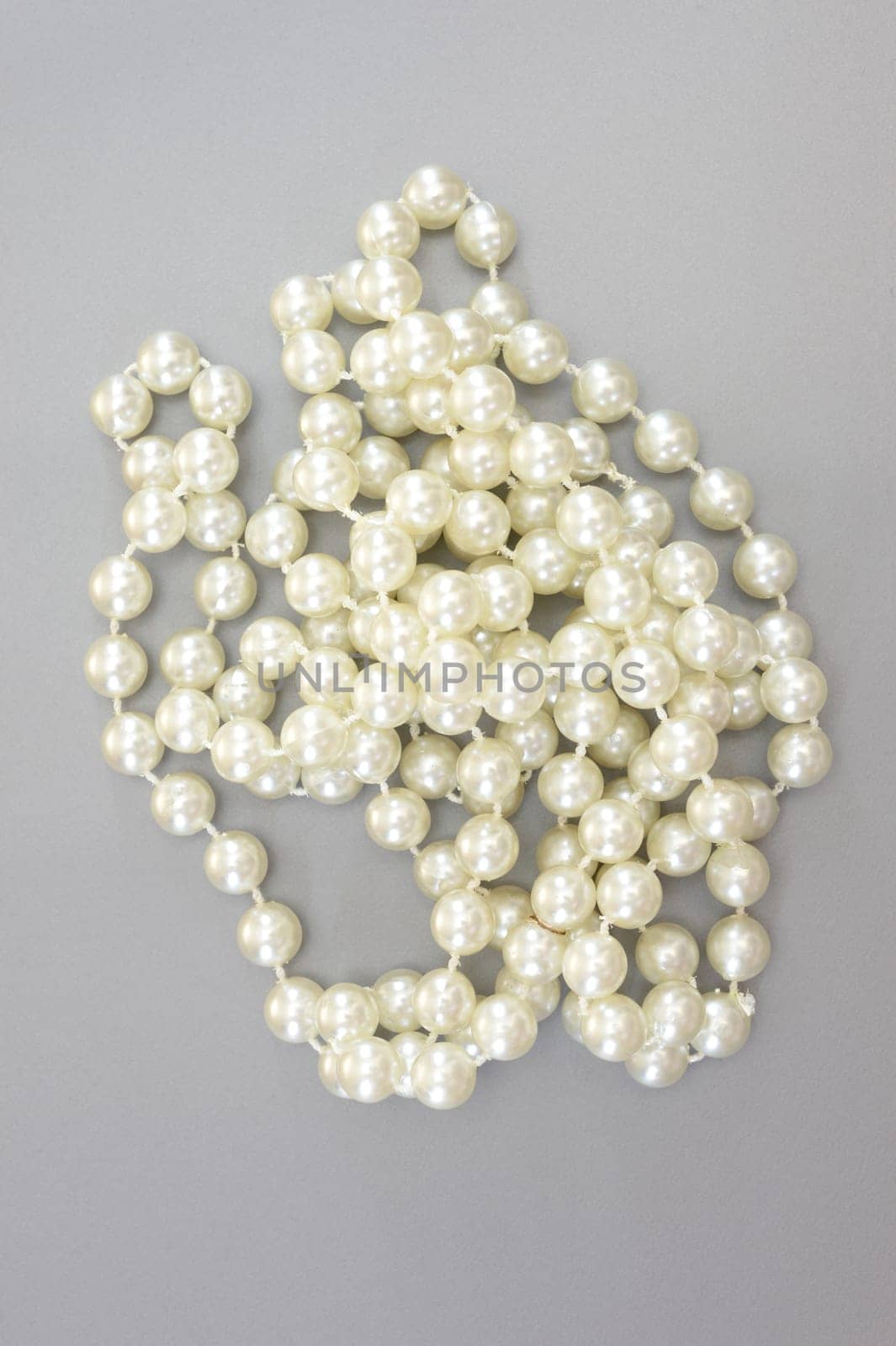 A close up shot of a pearl necklace