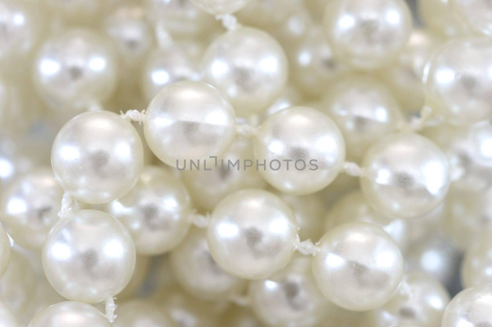 A close up shot of a pearl necklace