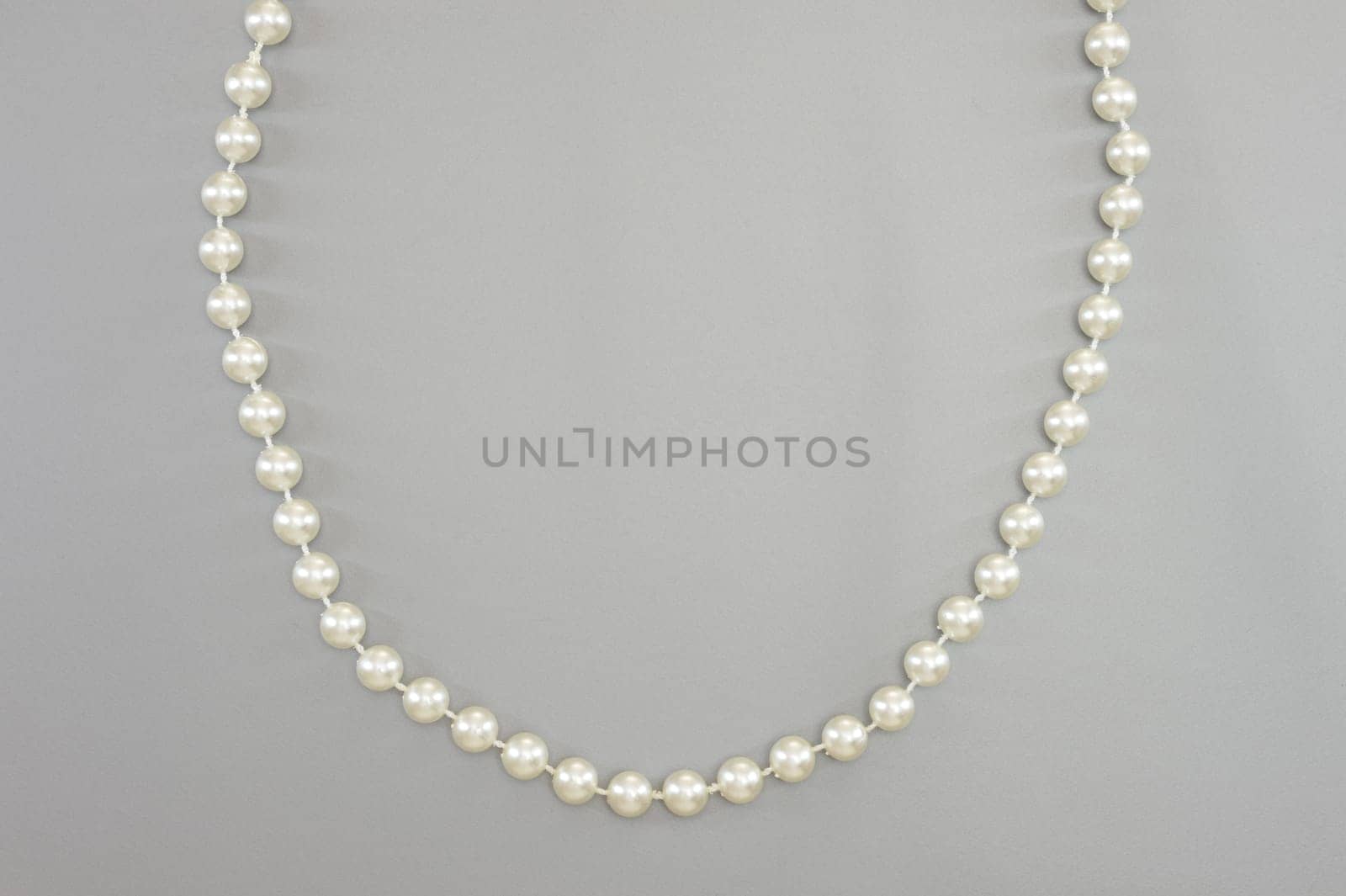 A close up shot of a pearl necklace