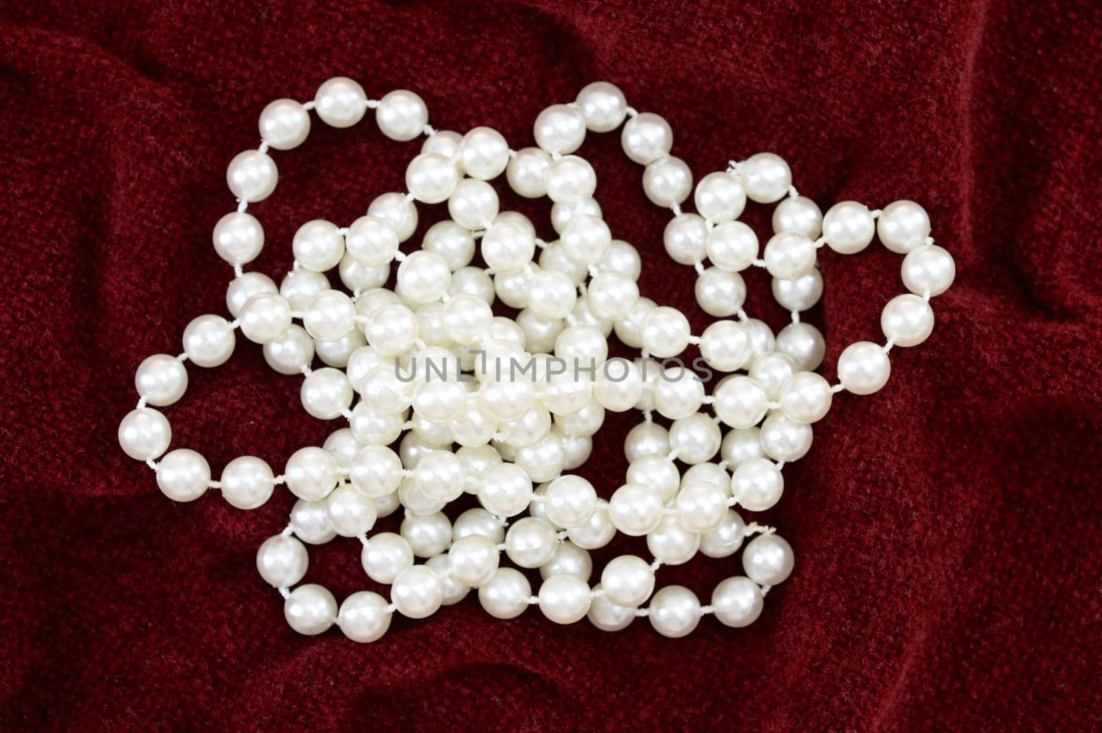 A close up shot of a pearl necklace