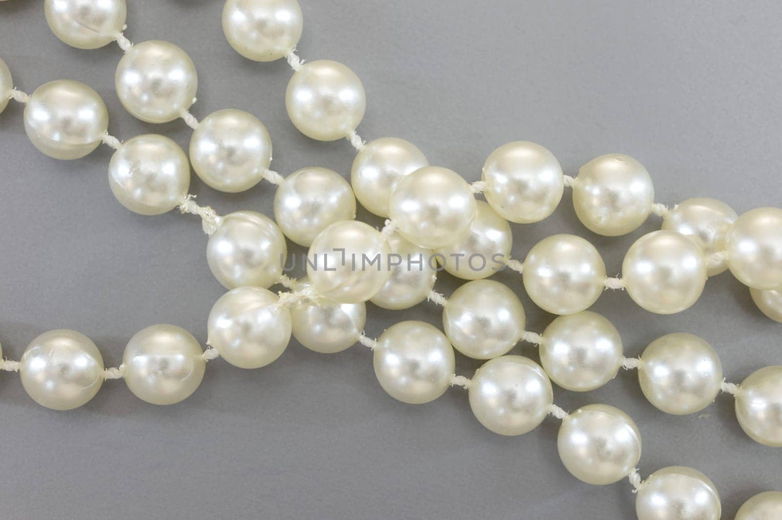 A close up shot of a pearl necklace