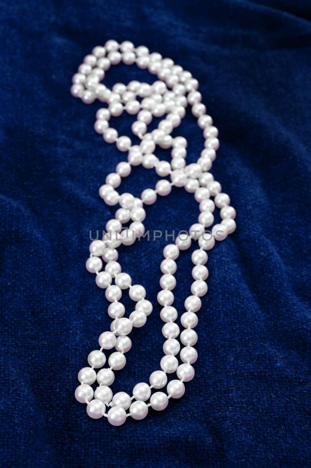A close up shot of a pearl necklace