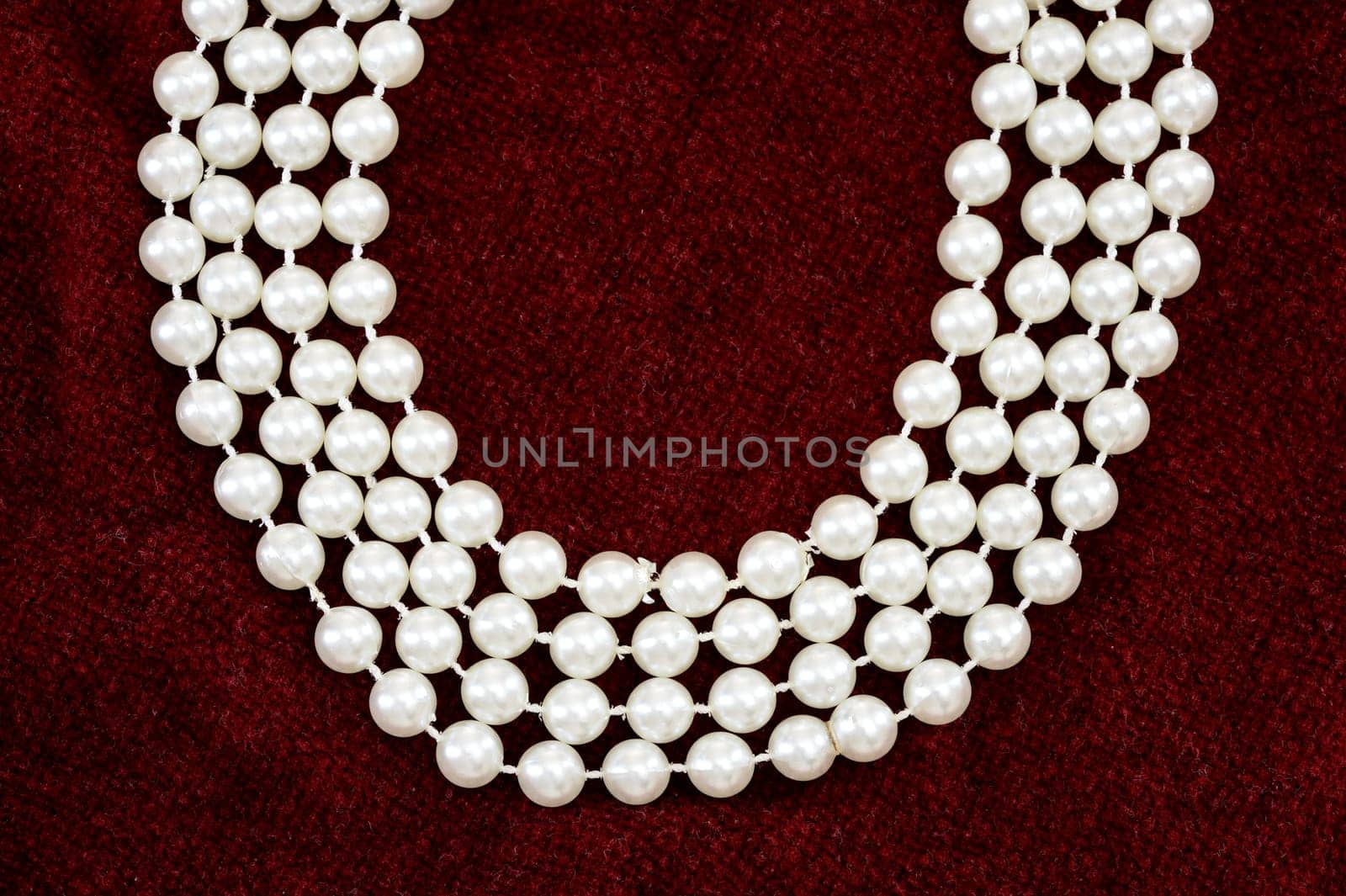 A close up shot of a pearl necklace