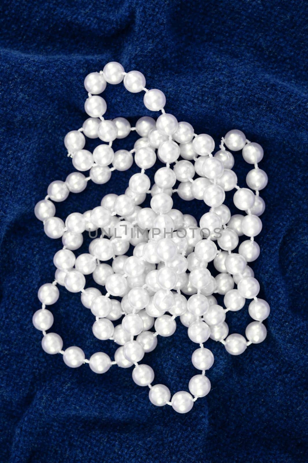 A close up shot of a pearl necklace