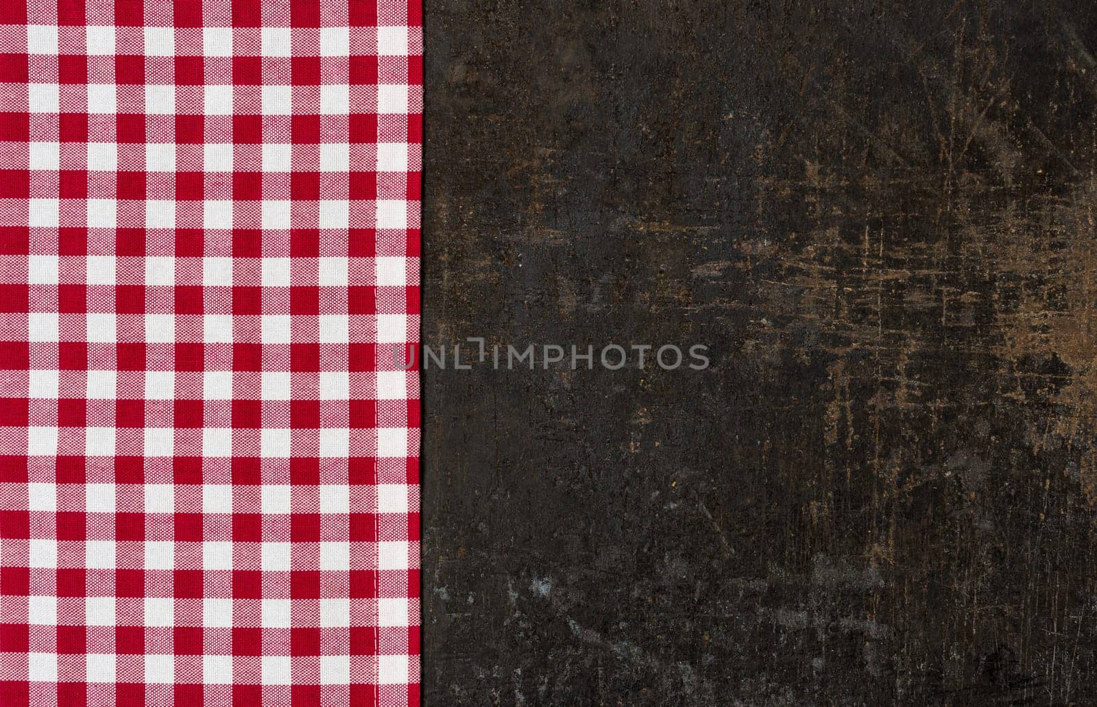 Antique baking tray with a red checkered tablecloth