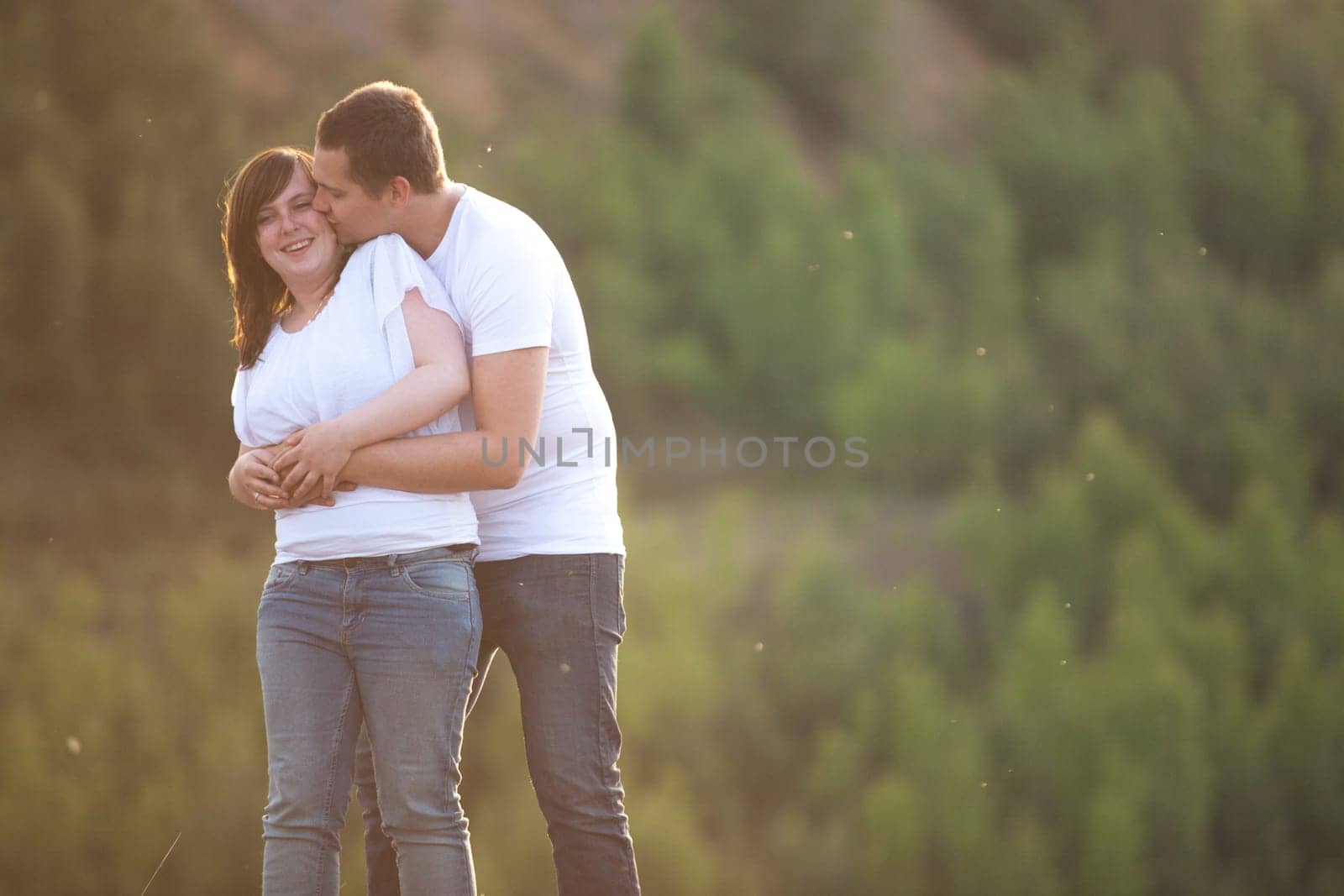 Young couple is having a romantic time in nature