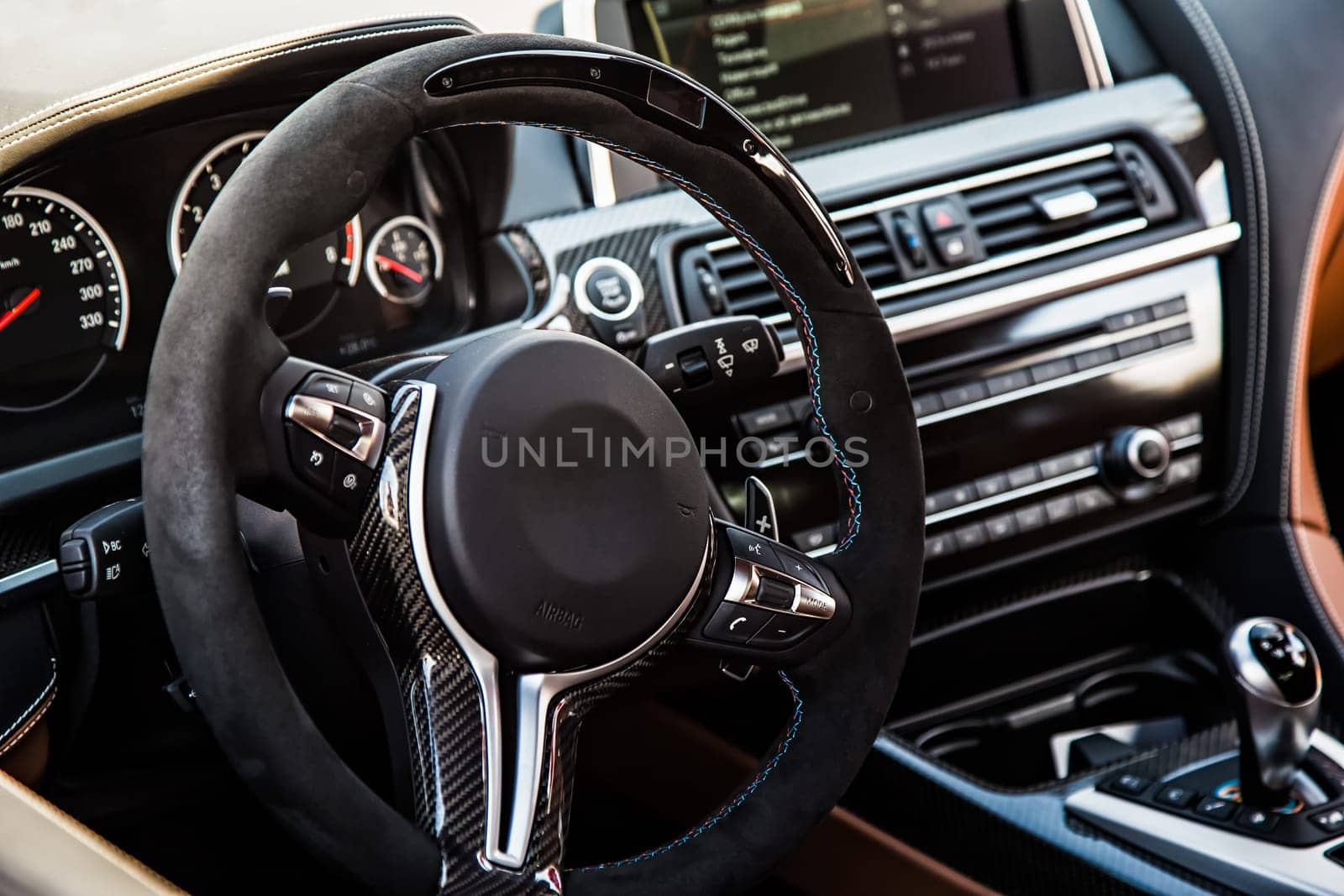 Steering wheel in interior of the sports car