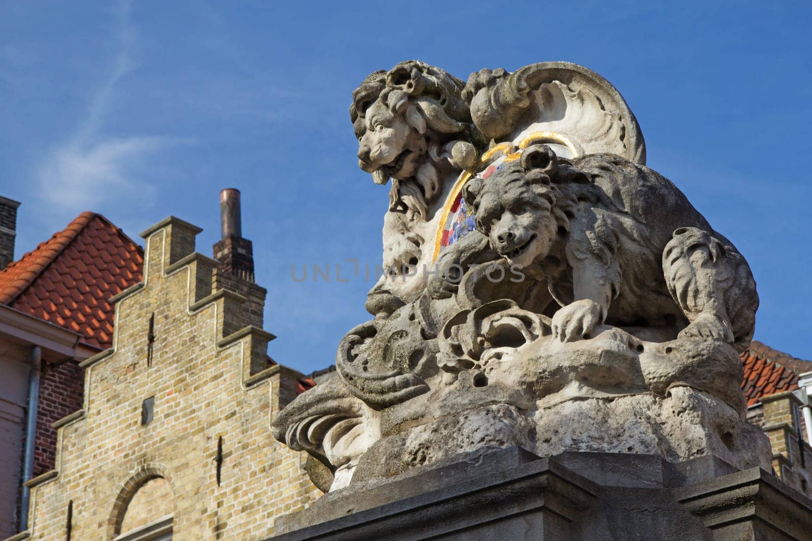 Closeup view of Lion On City Coat of Arms On A Water Fountain (Briges, Belgium)