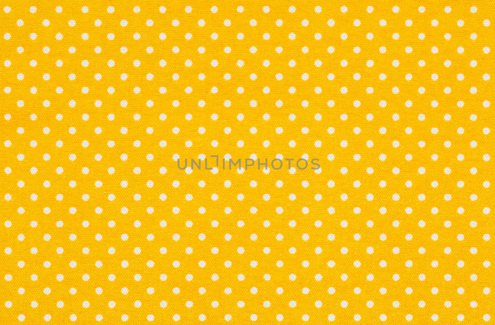 Yellow fabric with white dots