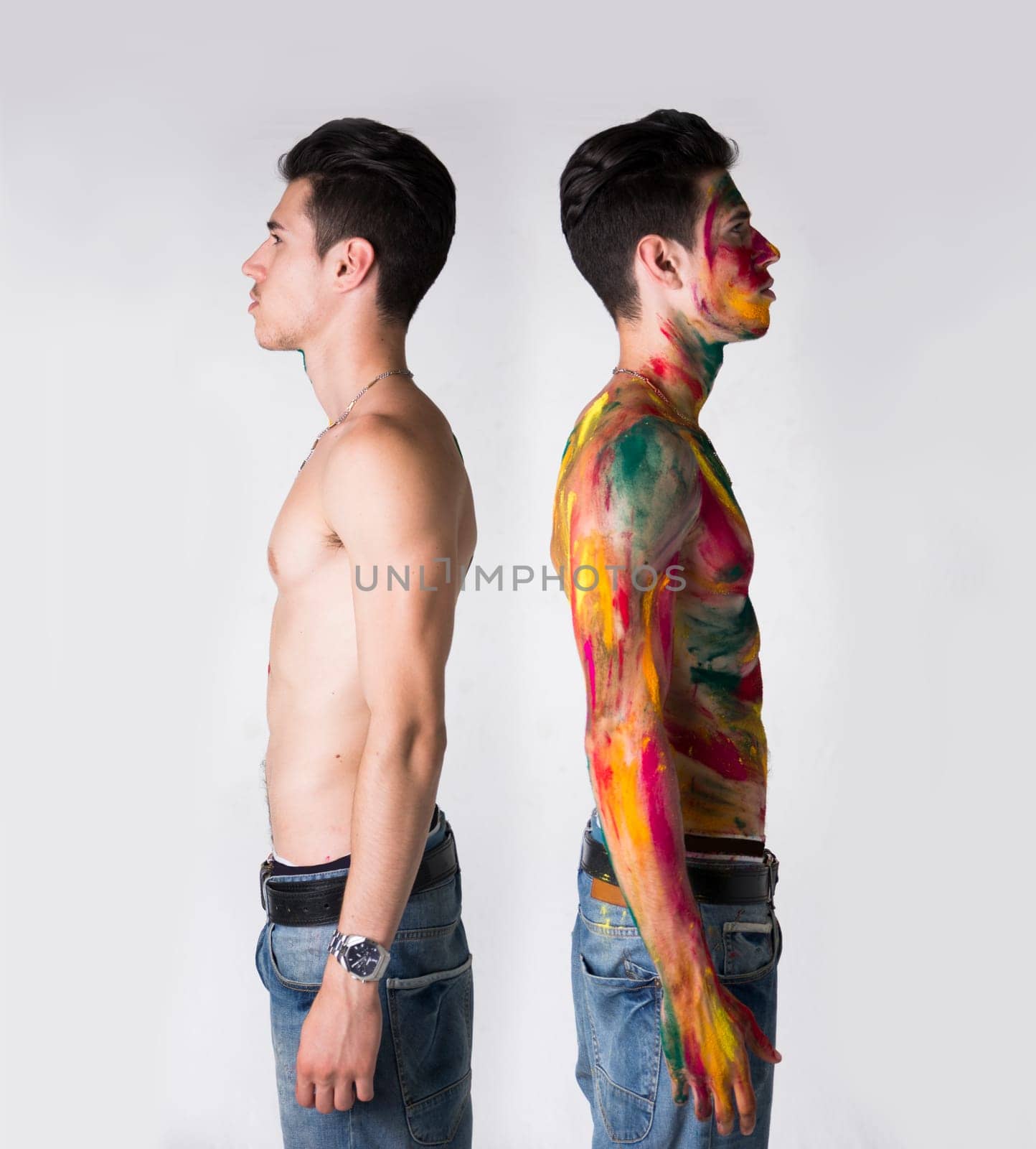 Two Topless Men Standing Back to Back, one with Body Paint Color