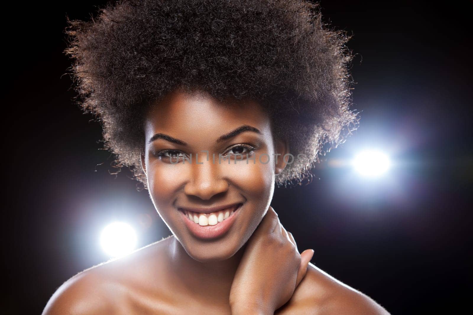 Beautiful young African woman with afro hairstyle