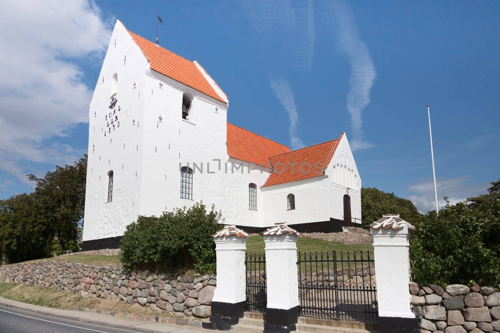 White church of Tryggelev on the main road to Bagenkop
