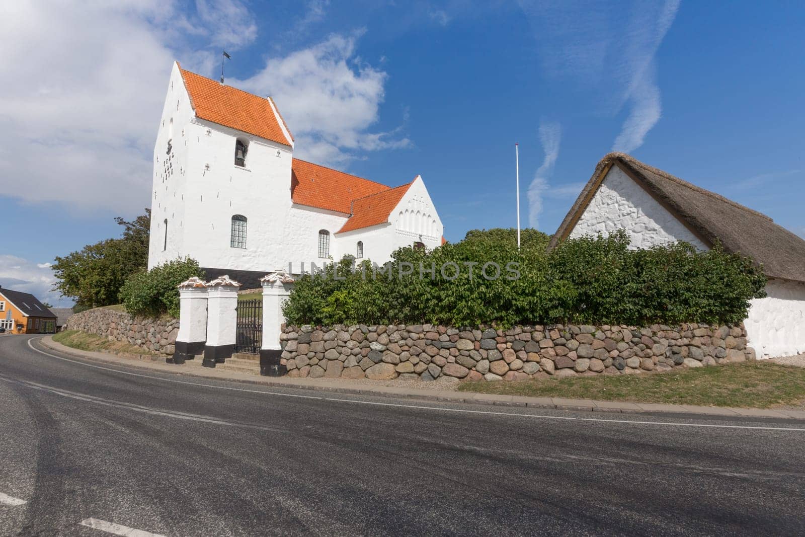 White church of Tryggelev on the main road to Bagenkop