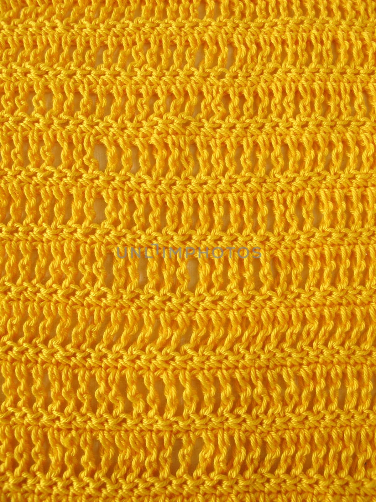 Crochet pattern of triple rods and solid stitches in yellow