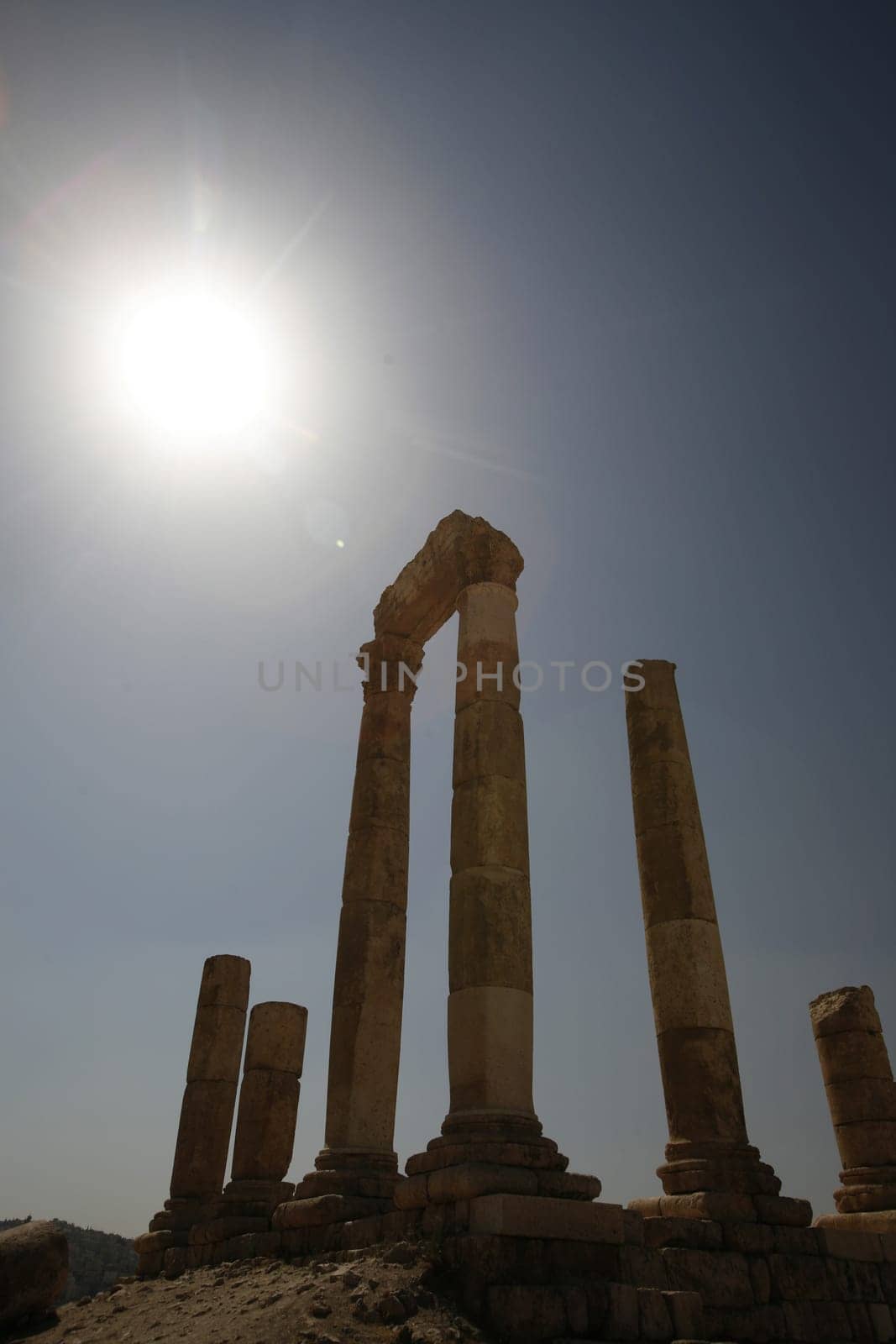 The Ruins of the citadel Jabel al Qalah in the City Amman in Jordan in the middle east.