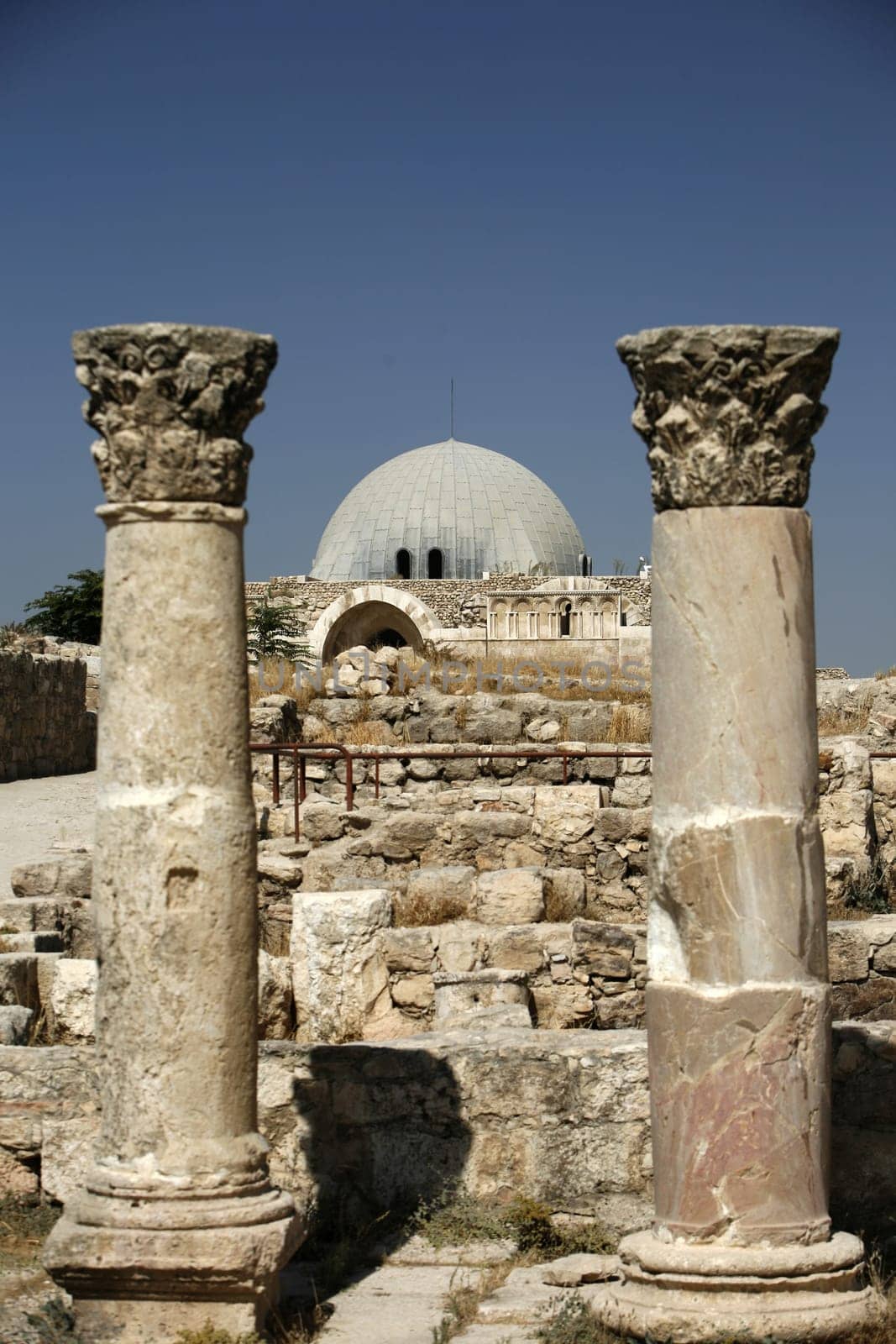 The Ruins of the citadel Jabel al Qalah in the City Amman in Jordan in the middle east.