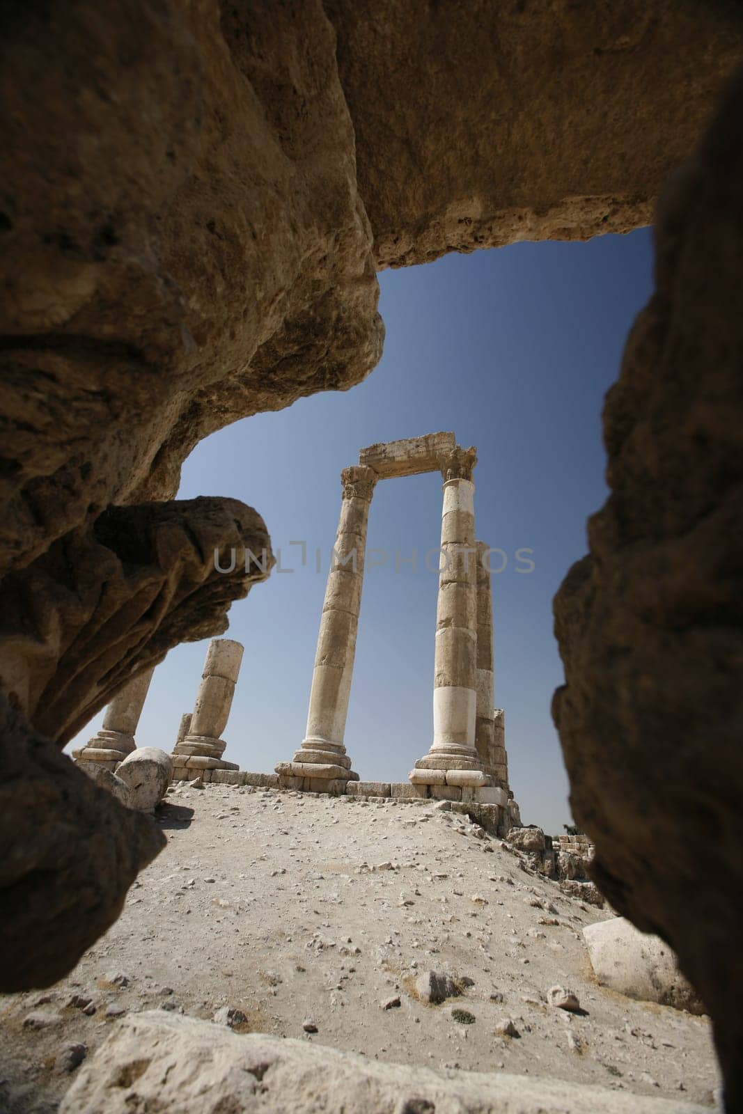 The Ruins of the citadel Jabel al Qalah in the City Amman in Jordan in the middle east.