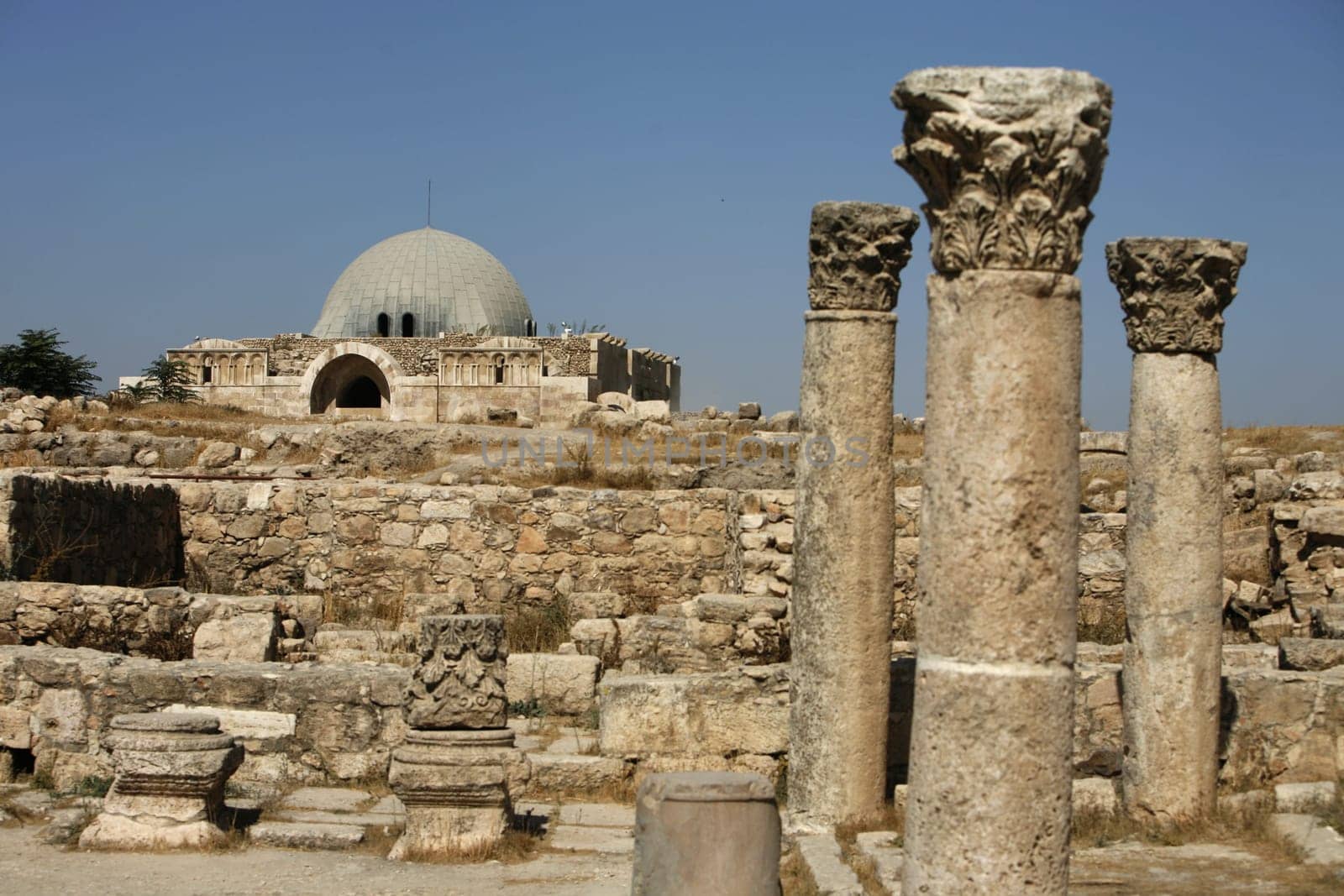 The Ruins of the citadel Jabel al Qalah in the City Amman in Jordan in the middle east.