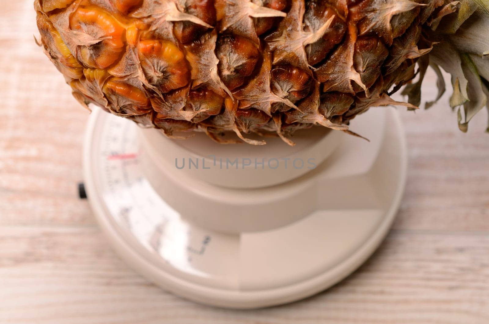 Pine apple on a scale