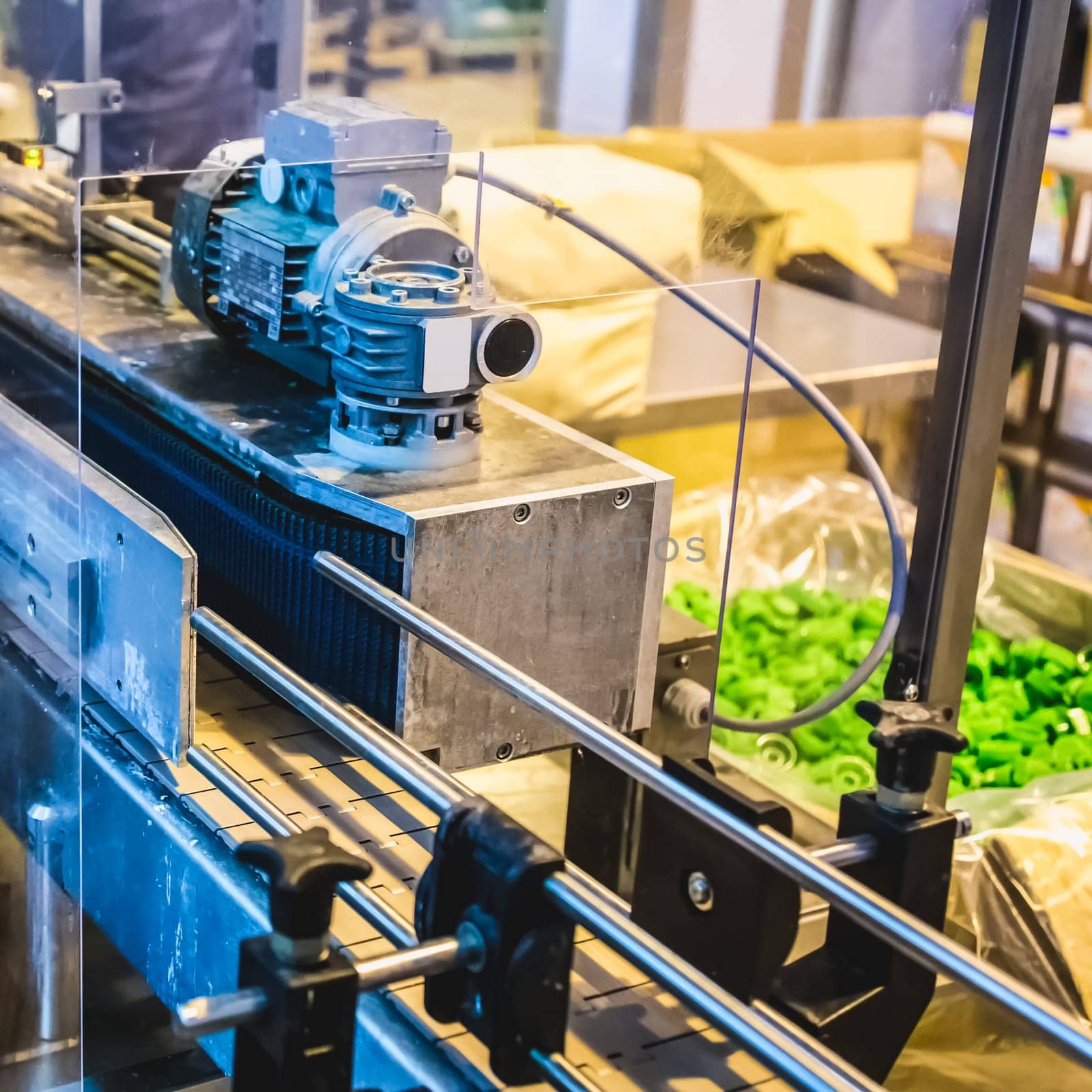 Automatic packing line of conveyor. Pharmaceutical and chemical industry. Manufacture on factory
