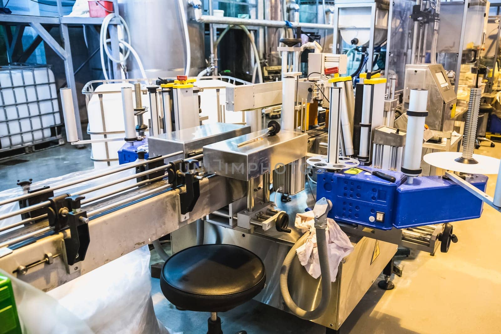 Automatic packing line of conveyor. Pharmaceutical and chemical industry. Manufacture on factory