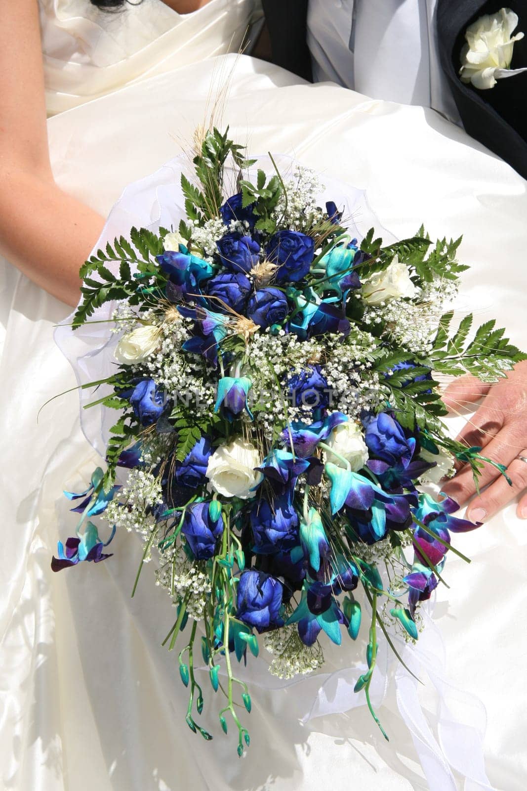 Wedding bouquet of flowers and couples.